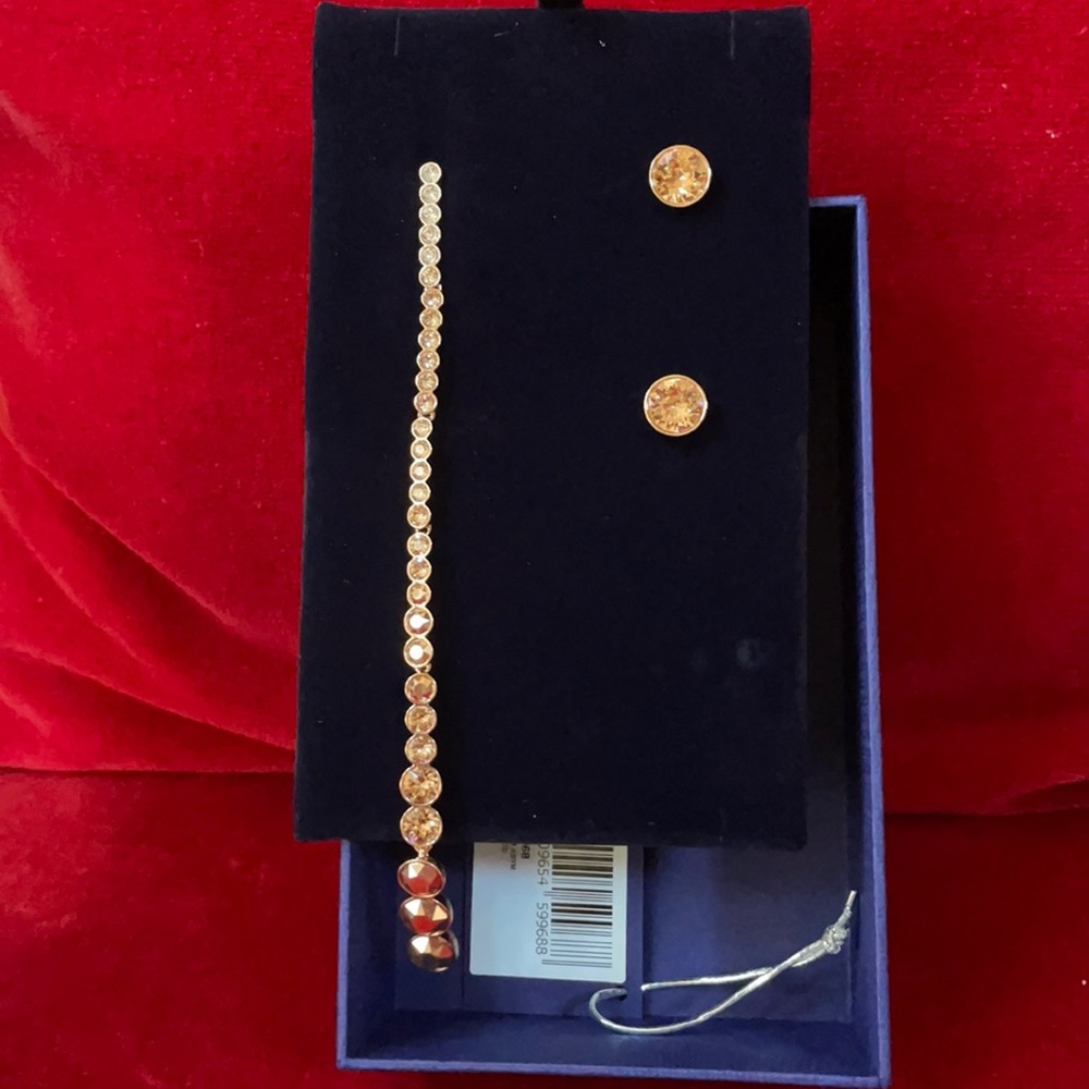 Brand new Swarovski long / studd crystal earrings